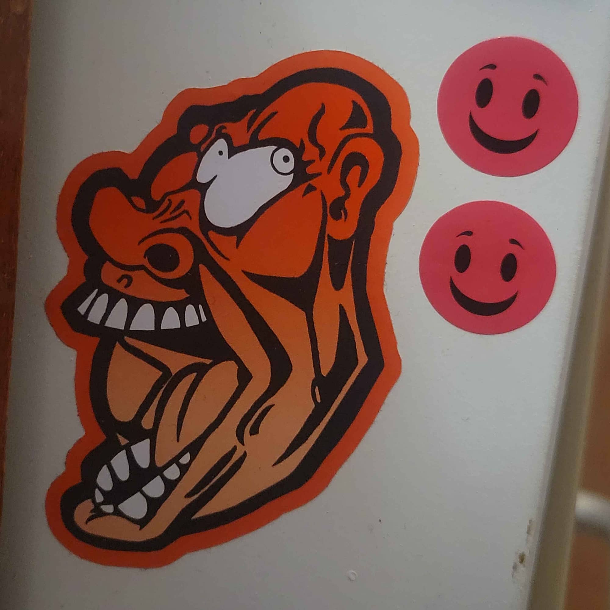 Red yelling face on my filing cabinet